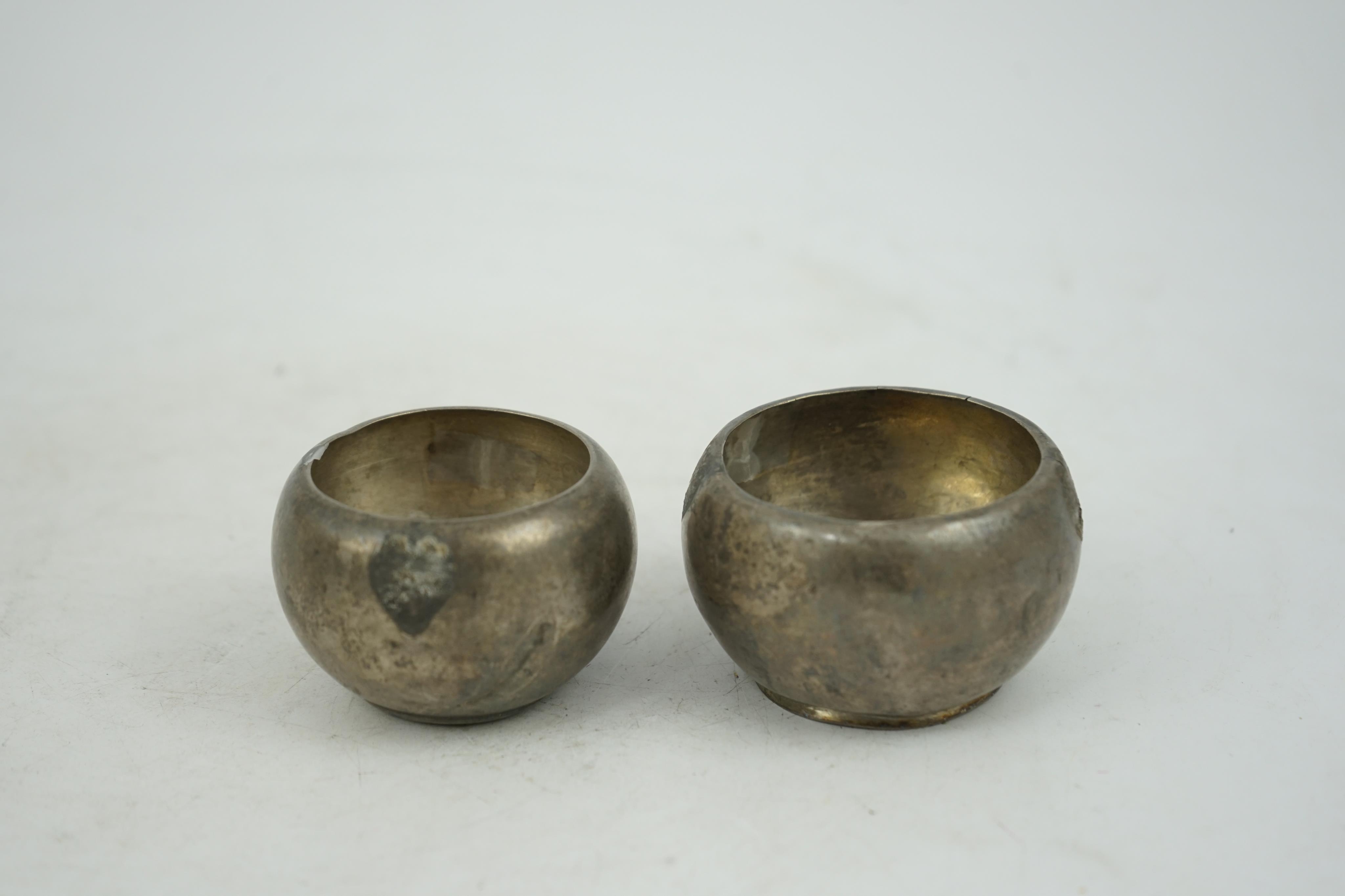 Two silver aryballoi, lacking handles, Roman or Gandhara, c. late 1st century BC - early 1st century A.D.